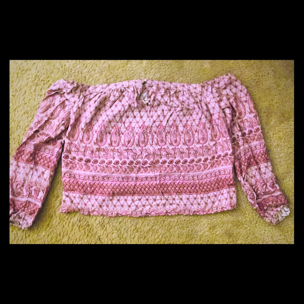 Shoulder off cut out women shirt.